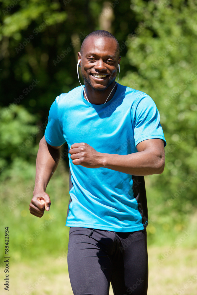 Happy smiling african american man running Happy smiling african american man running