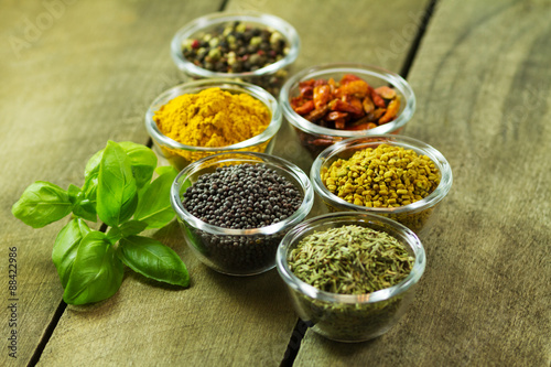 spices and seasonings on a wooden table
