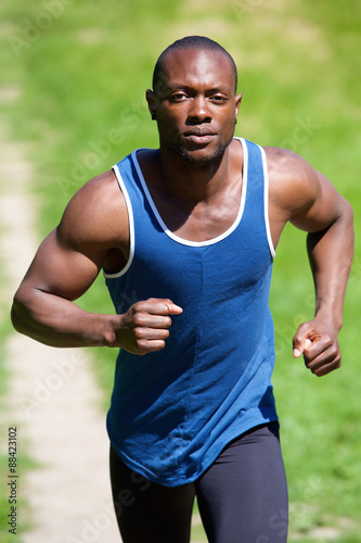 Healthy african american man running outdoors