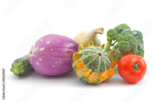 several different fresh vegetables on white background