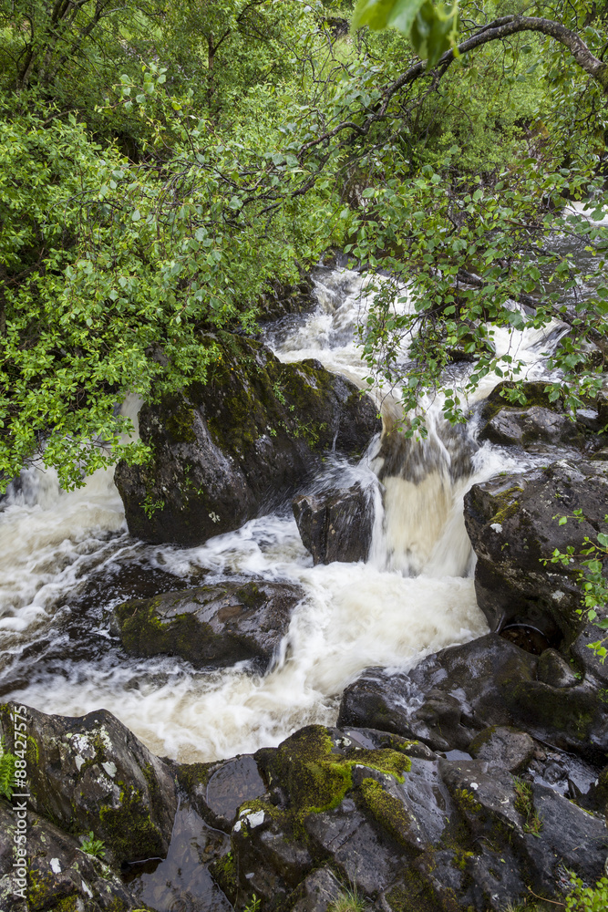 Waterfall on Watendlath Beck, English Lake District, Cumbria, England, UK.