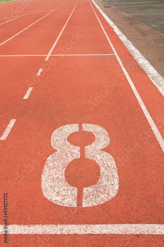 Obraz na płótnie Athletics track lane number eight w salonie