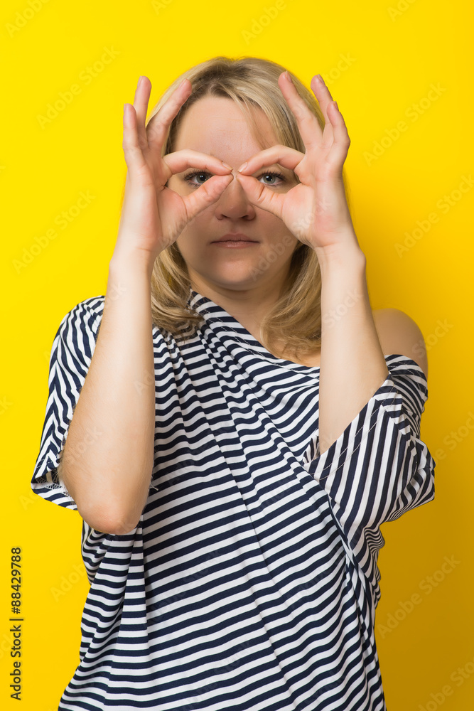 young woman looking through binocular young woman looking through binocular