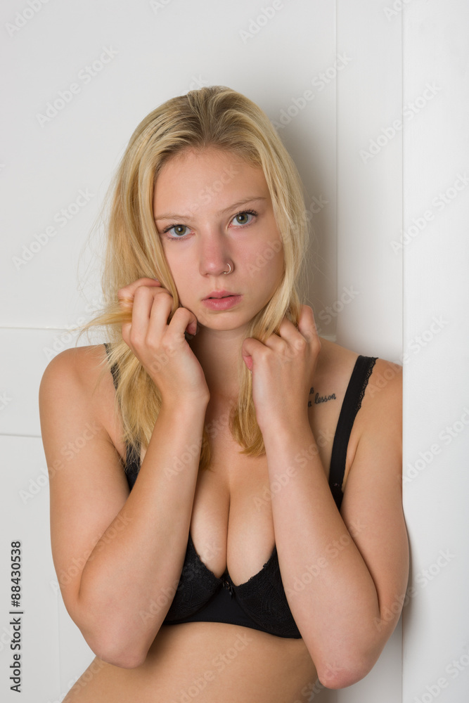 Studio Portrait of a beautiful blond woman with long hair Studio Portrait of a beautiful blond woman with long hair