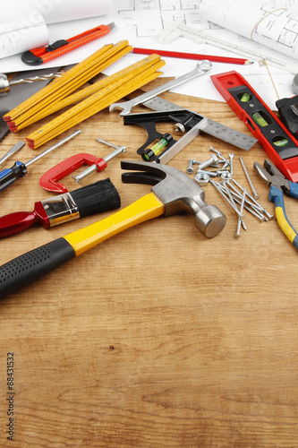 Assorted carpentry tools on wood © Stillfx