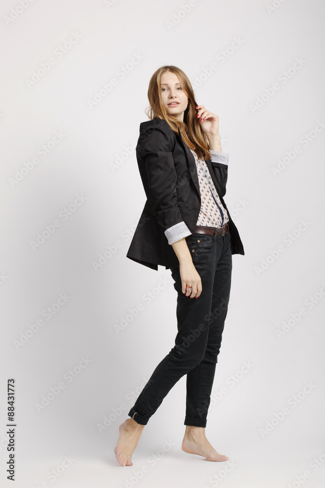 girl posing in grey background girl posing in grey background