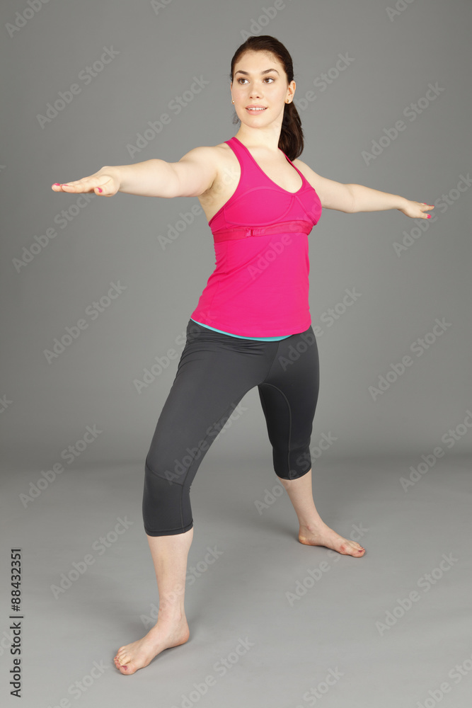 A young woman exercising. A young woman exercising.