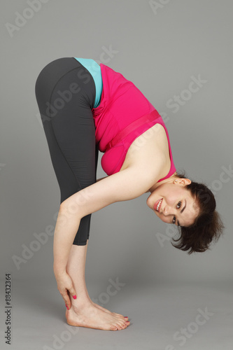 A young woman stretching.