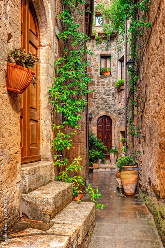 Alley in old town Pitigliano Tuscany Italy photo