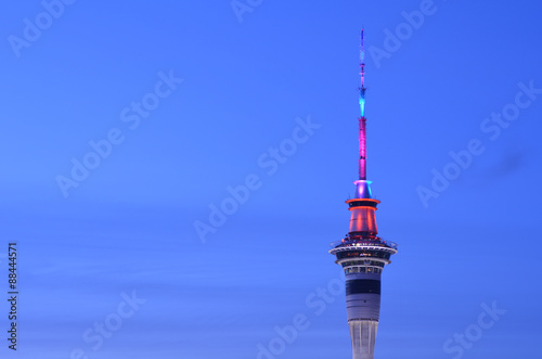 Aerial view of Auckland Sky tower in colors at dusk