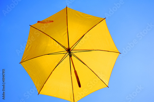 Street decorated with colored umbrellas.