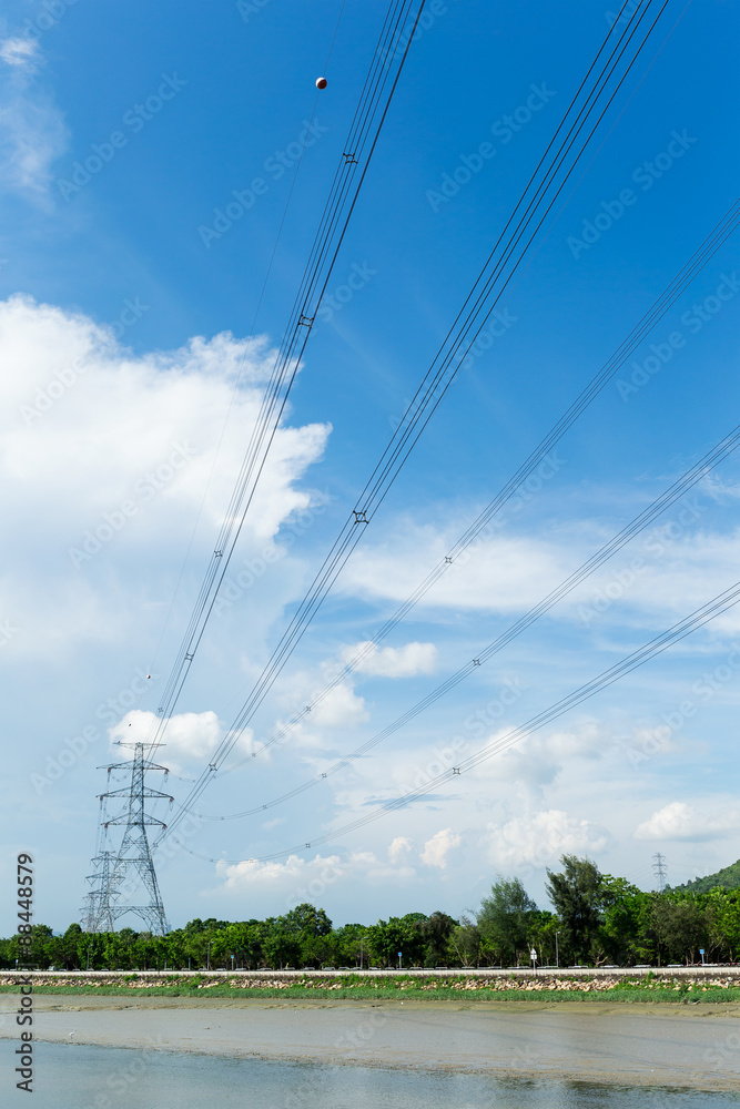 Obraz premium Electrical transmission tower at day time