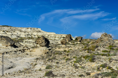Picturesque mountains and rocks of unusual bizarre in Sarakiniko, Milos, Cyclades, Greece.