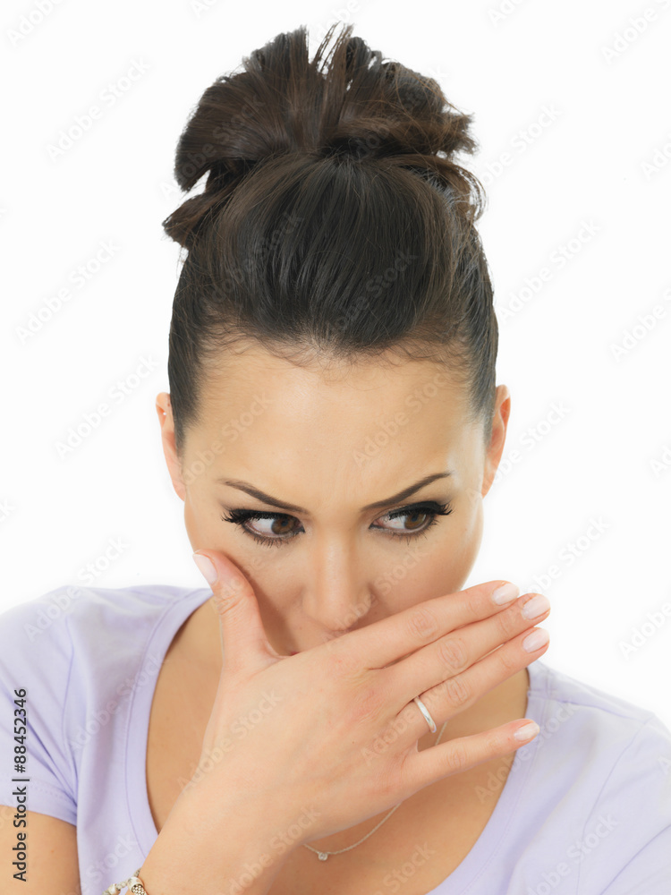 Portrait Of A Nervous Shy Beautiful Young Hispanic Woman Covering Her Mouth Portrait Of A Nervous Shy Beautiful Young Hispanic Woman Covering Her Mouth