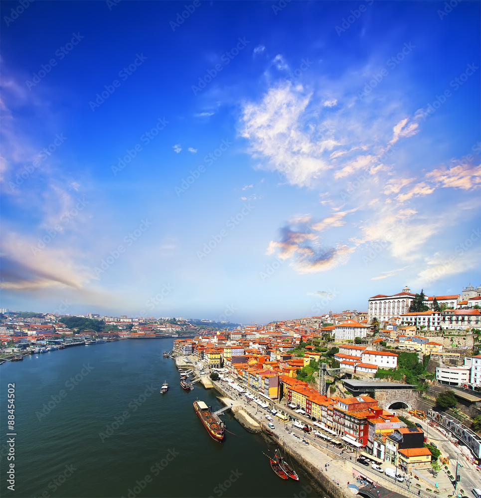view of Douro riverside from the Dom Luiz bridge , Porto , Portugal. Colorful Travel background