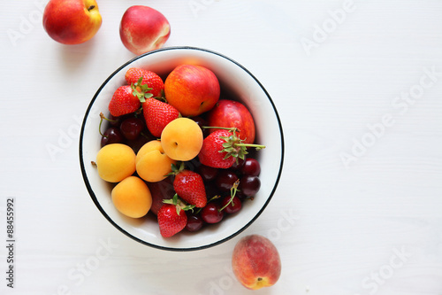 fresh fruits and berries in bowl