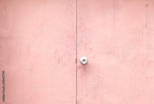 Old orange door with handle background