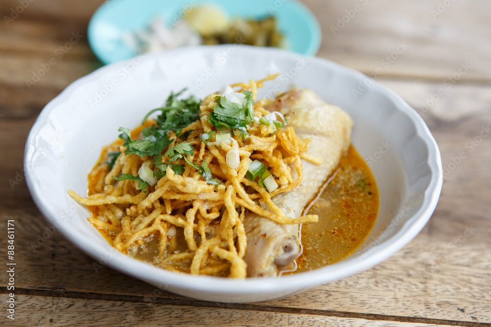 curried chicken noodles soup famous food in North of Thailand curried chicken noodles soup famous food in North of Thailand