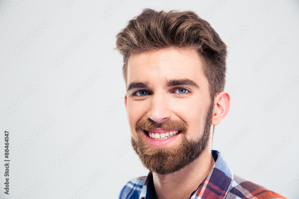 Obraz premium Cheerful young man looking at camera