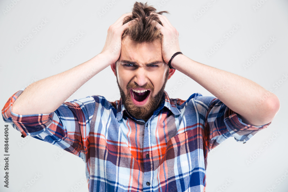 Portrait of upset man screaming