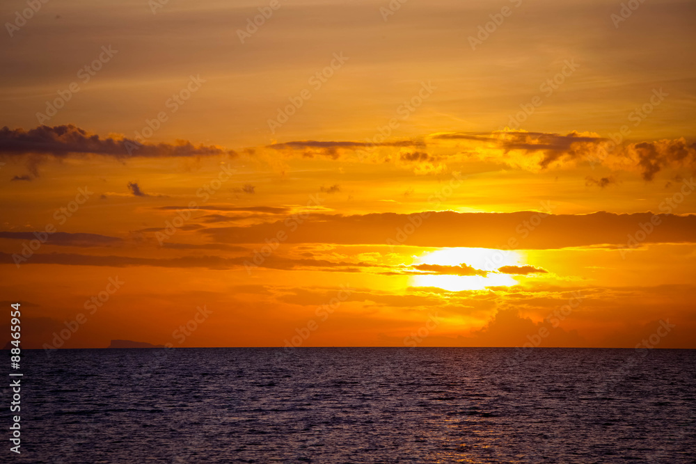 amazing sunset over beautiful sky with clouds, rippling waters