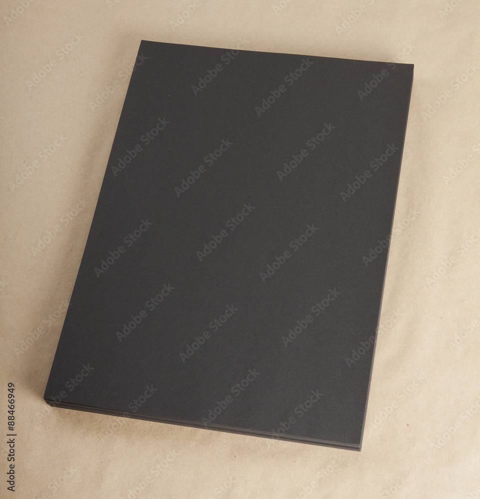 Fototapeta premium Blank flyer poster on cardboard to replace your design.