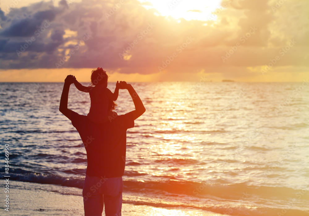 Fototapeta premium father and daughter having fun on sunset sky
