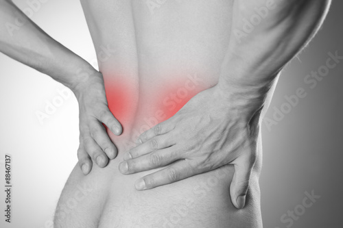 Kidney pain. Man with backache. Pain in the man's body