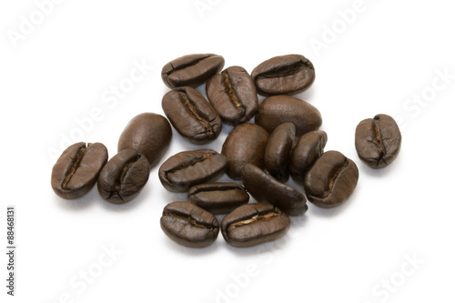 Coffee beans isolated on white background. Studio image of coffee beans. Coffee beans close-up. 