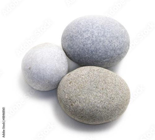 Beautiful stones isolated on white background with shadow. Closeup grouped round stones. Studio photographed stones.