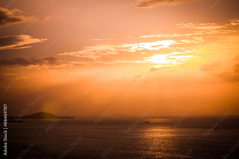 Dramatic Sunset on the beach with golden beautiful sky