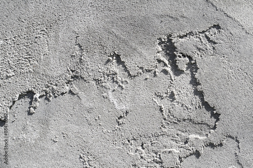 Close-Up of Sunlit Textured Concrete Wall