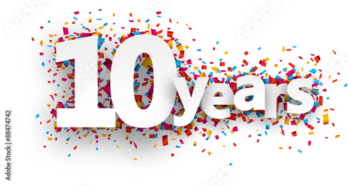 Ten years paper confetti sign.