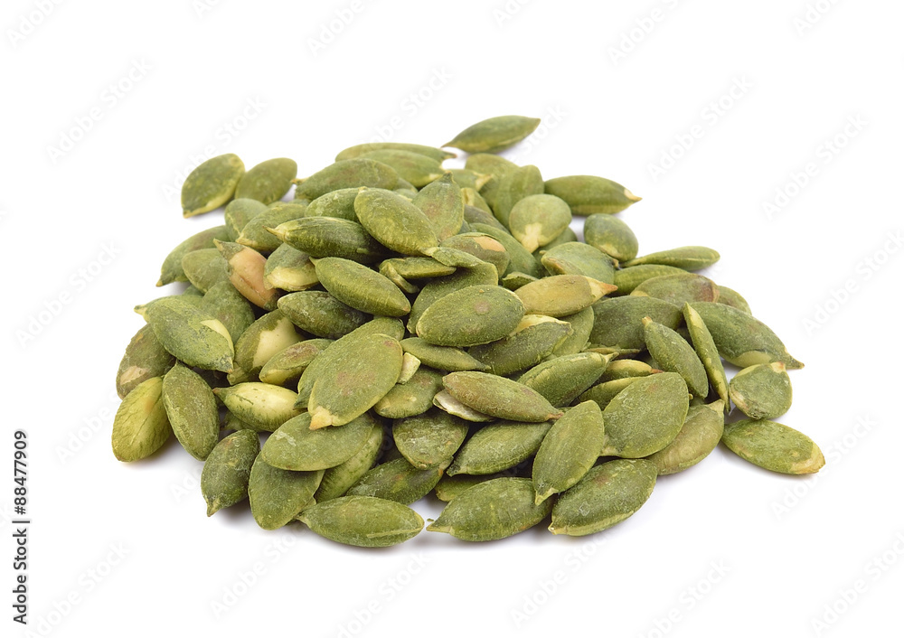 pumpkin seeds on white background pumpkin seeds on white background
