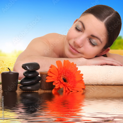  young woman relaxing in spa salon