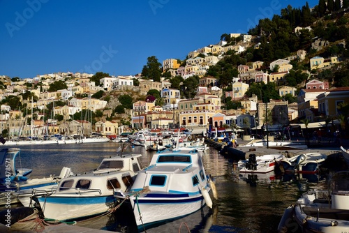 Boats moored in Symi Island harbour Greece