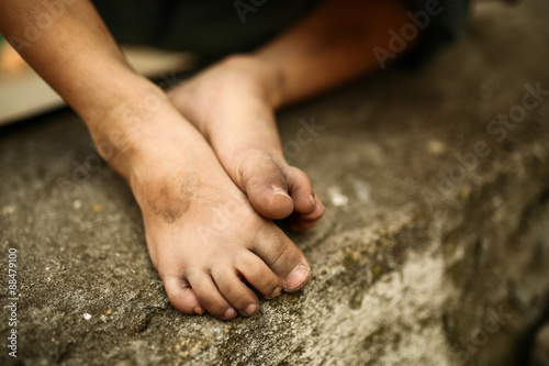 alone sad child on a street