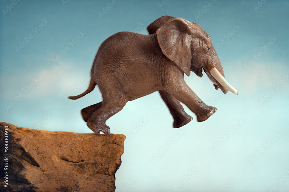 Obraz premium leap of faith concept elephant jumping into a void