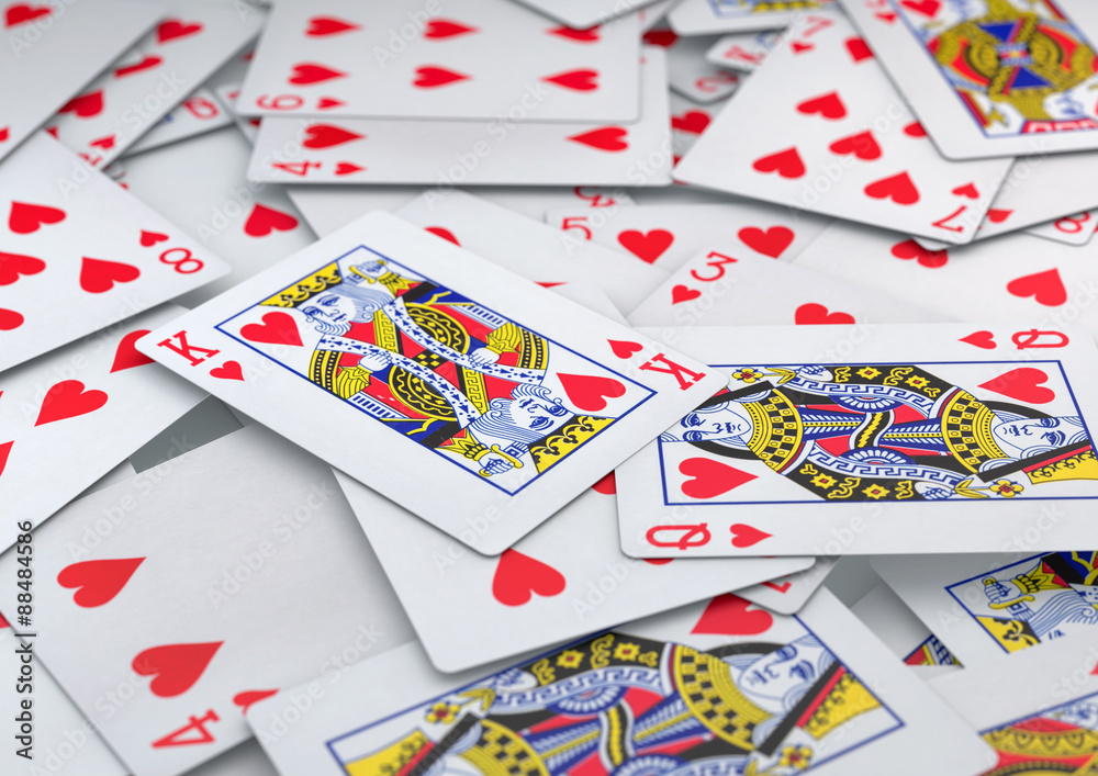 Pile of cards heart suite lying on table Pile of cards heart suite lying on table