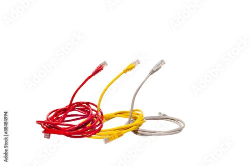 Three multicolored network cables in the form of a cobra snake