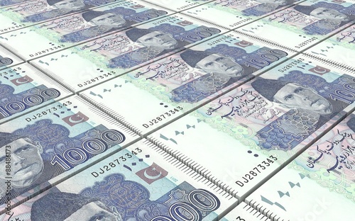 Pakistan rupee bills stacks background.