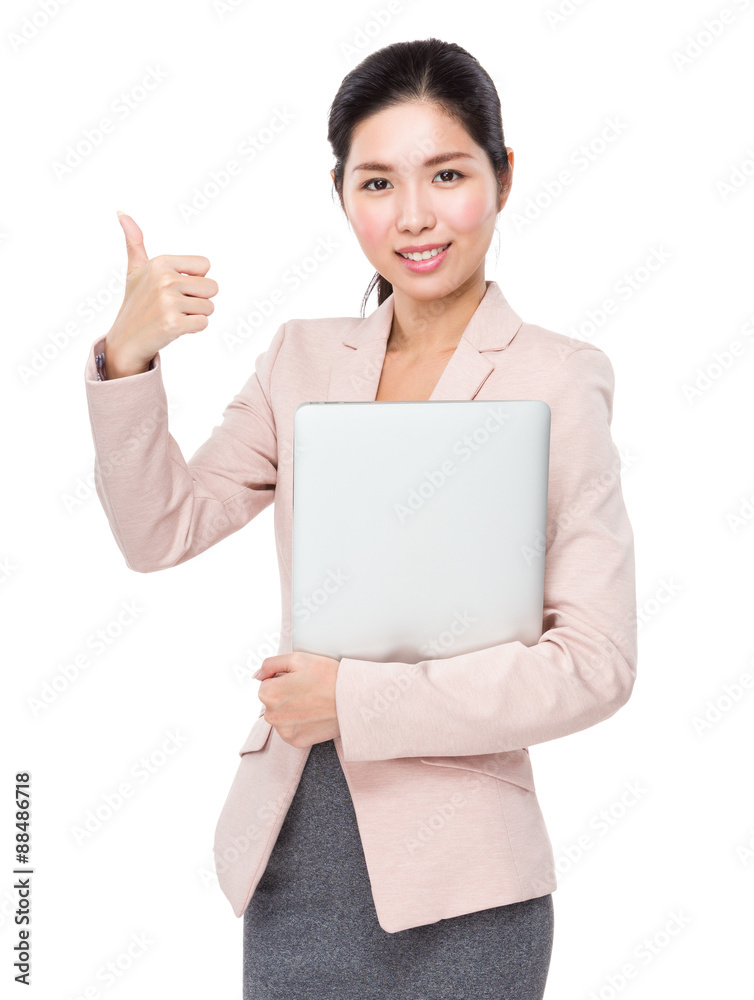 Young businesswoman with laptop computer and thumb up Young businesswoman with laptop computer and thumb up
