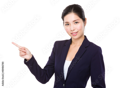 Young businesswoman with finger point up