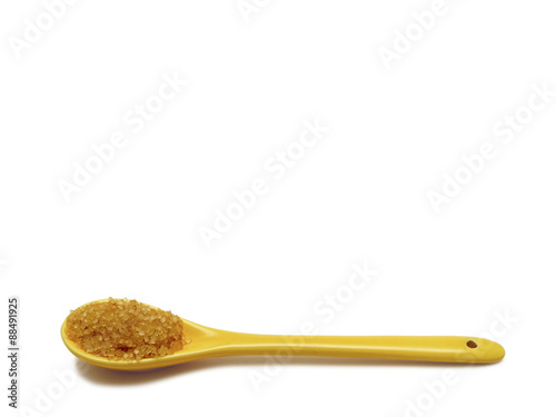 Ceramic spoon with brown sugar