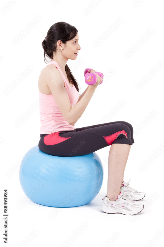 girl lifting weights in gym ball girl lifting weights in gym ball