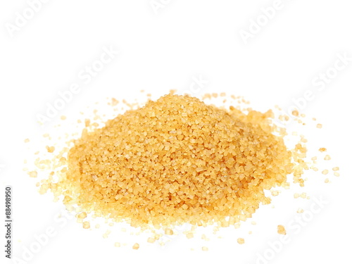 pile brown sugar isolated on white background, sugarcane
