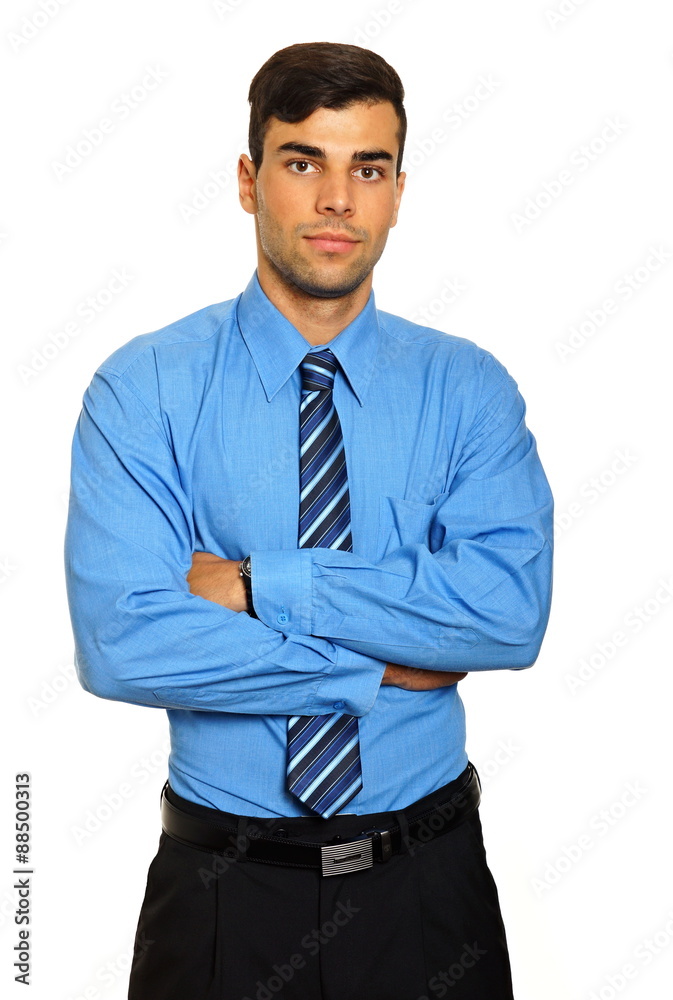 Portrait of young standing businessman in blue shirt and tie Portrait of young standing businessman in blue shirt and tie