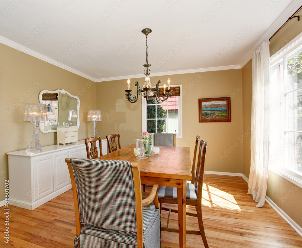 Fototapeta premium Classic dinning room with white cabinets.
