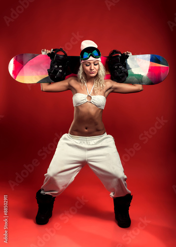 Girl with snowboard.