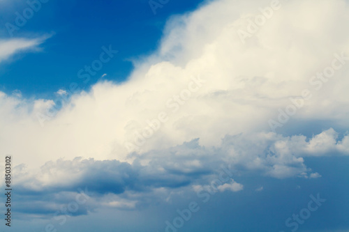 Blue sky with rainy clouds